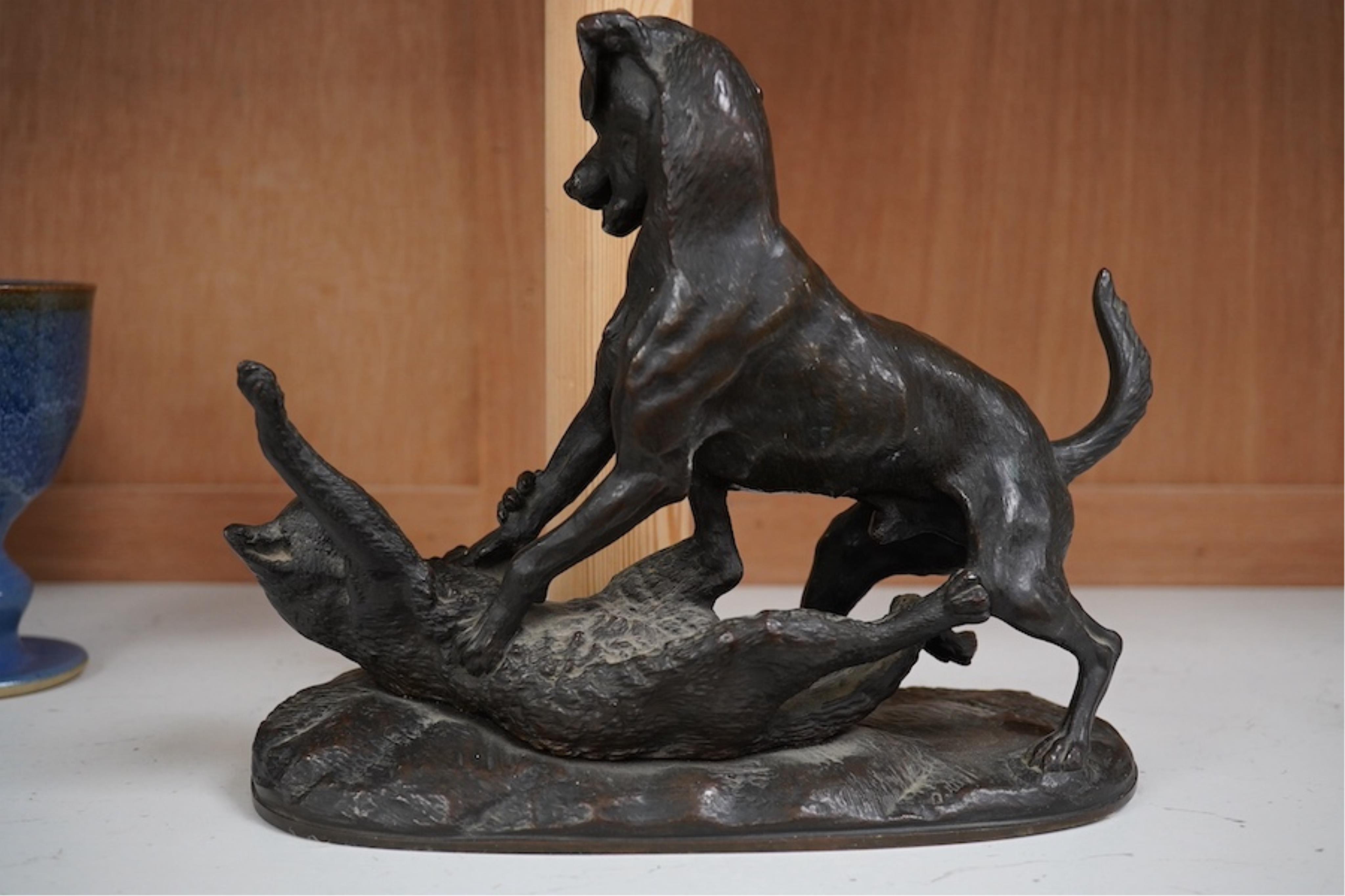 Pierre Louis Rouillard (1820-1881), a bronze group of a dog attacking a cat, signed, 20cm high. Condition - good